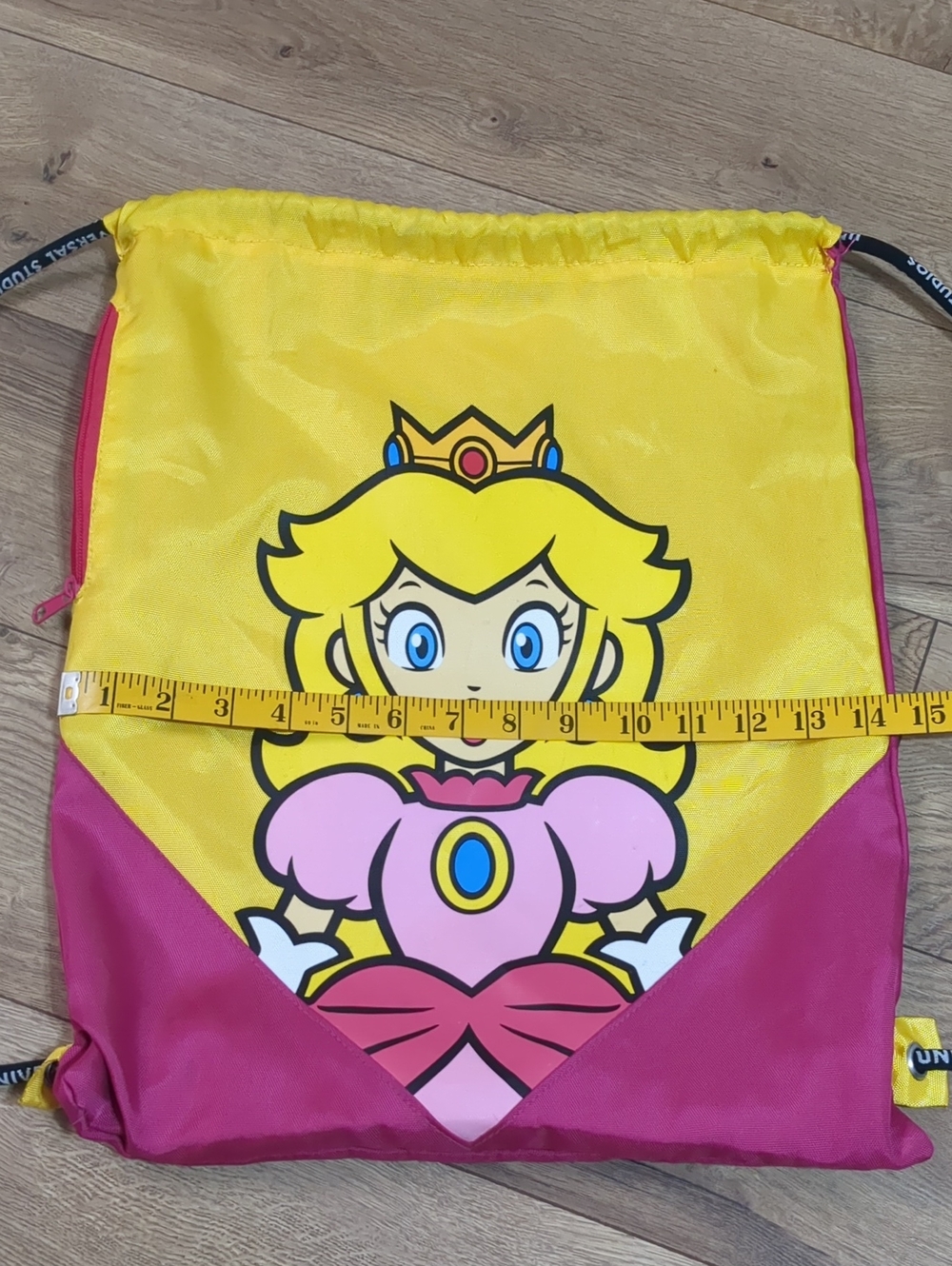 UNIVERSAL STUDIOS SUPER NINTENDO WORLD PRINCESS PEACH DRAWSTRING BACKPACK - Picture 8 of 9